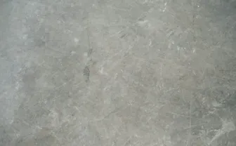 A close-up view of a gray concrete surface