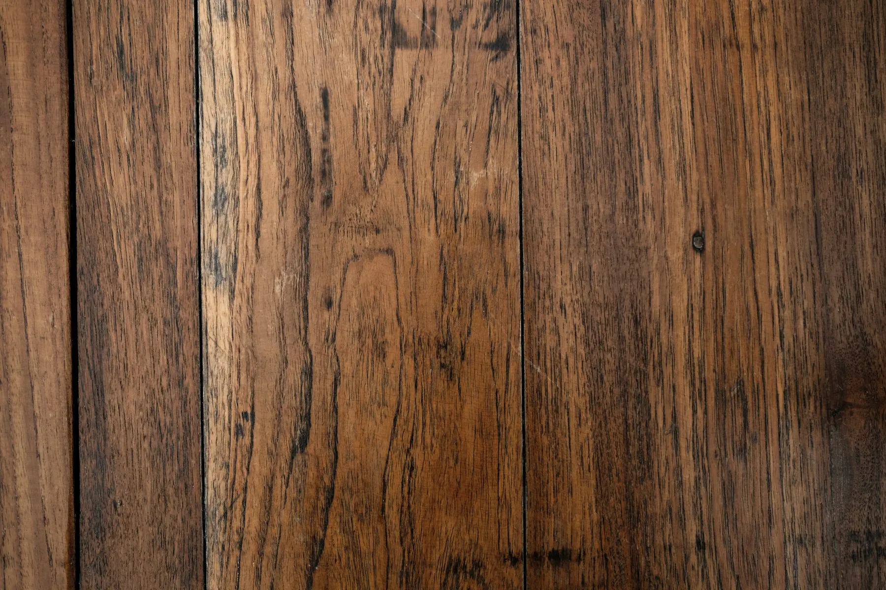 A close-up of a brown wooden flooring surface