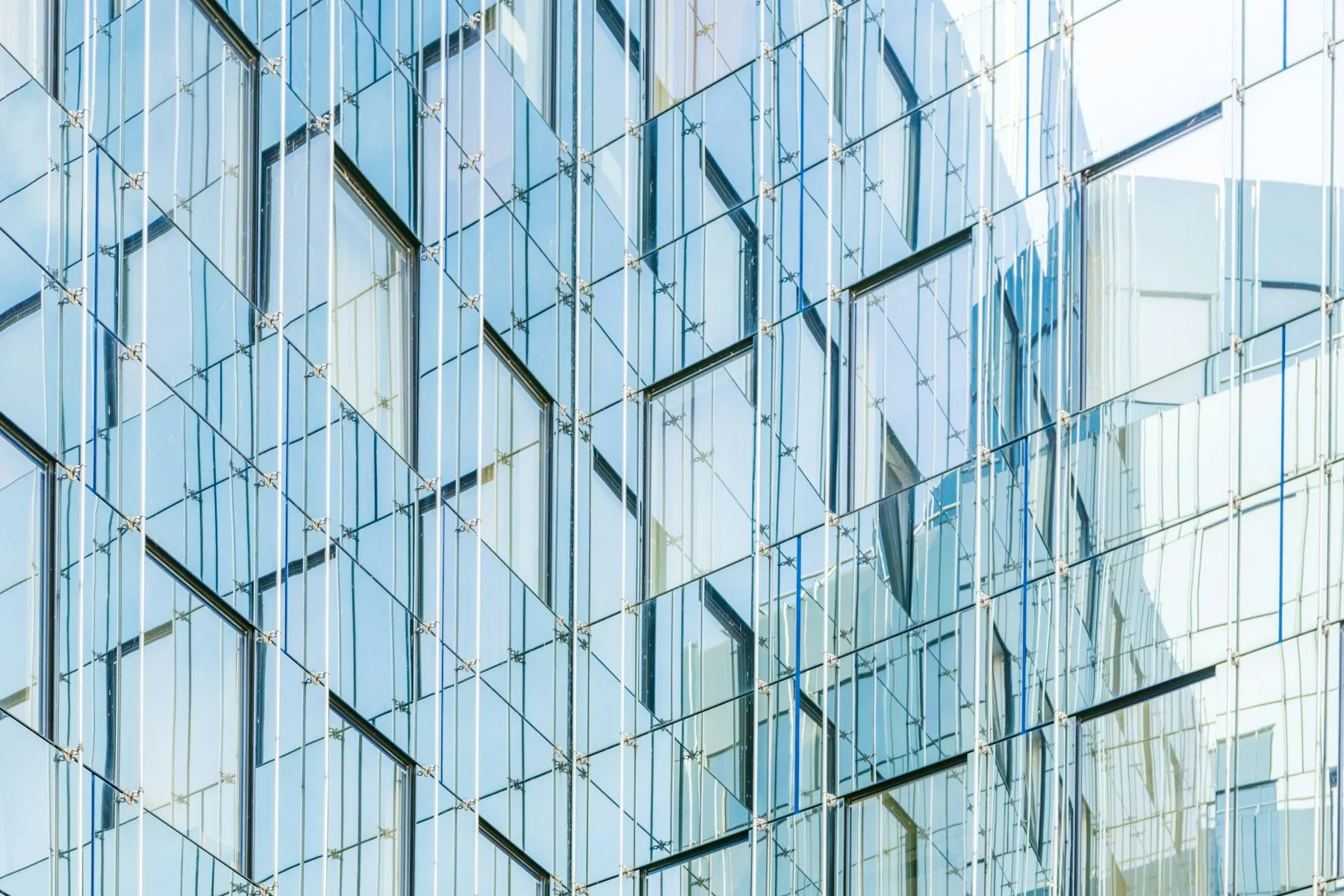 A glass curtain-wall building facade