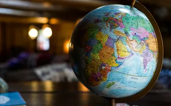 A desk globe on a table